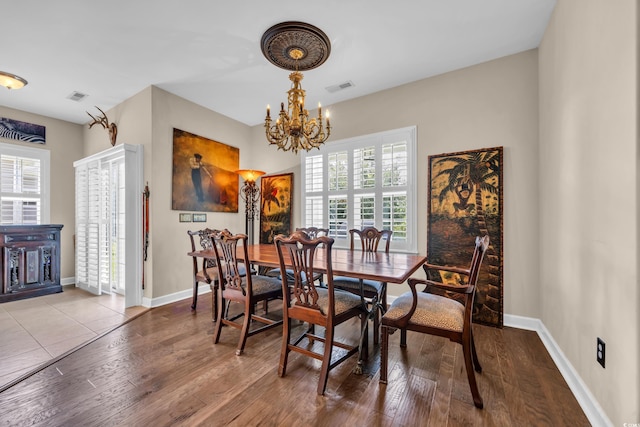 773 Wintercreeper Dr, Longs, SC 29568 - dining space featuring a chandelier and hardwood / wood-style floors