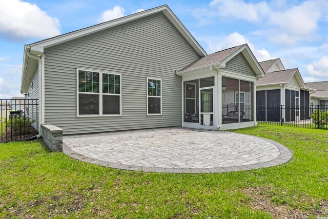 1178 Pyxie Moss Dr, Little River, SC 29566 - back of property featuring a sunroom and a patio area