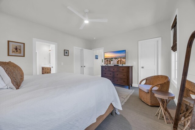 573 S Dunes Dr, Pawleys Island, SC 29585 - bedroom with carpet floors, ceiling fan, and ensuite bathroom