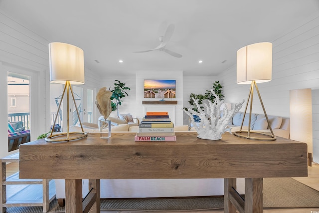 573 S Dunes Dr, Pawleys Island, SC 29585 - home office with a ceiling fan, wooden walls, wood finished floors, and recessed lighting