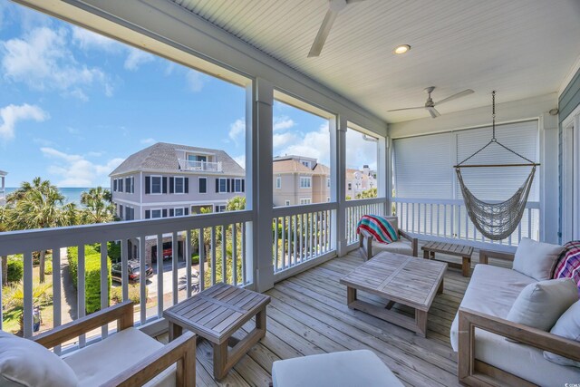 573 S Dunes Dr, Pawleys Island, SC 29585 - sunroom featuring ceiling fan and outdoor lounge area