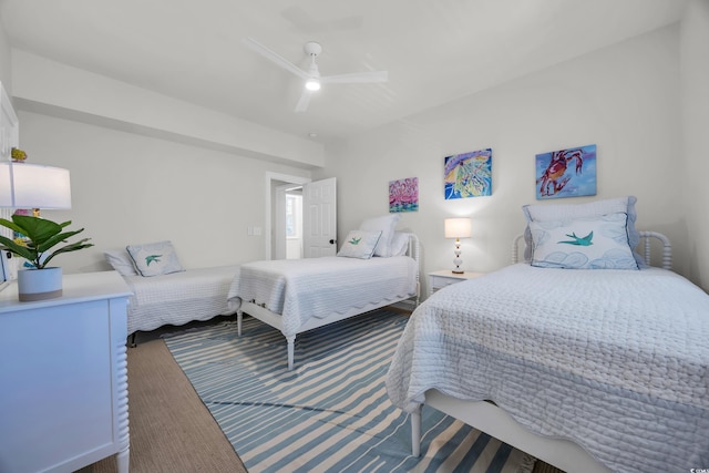 573 S Dunes Dr, Pawleys Island, SC 29585 - bedroom with a ceiling fan and wood finished floors