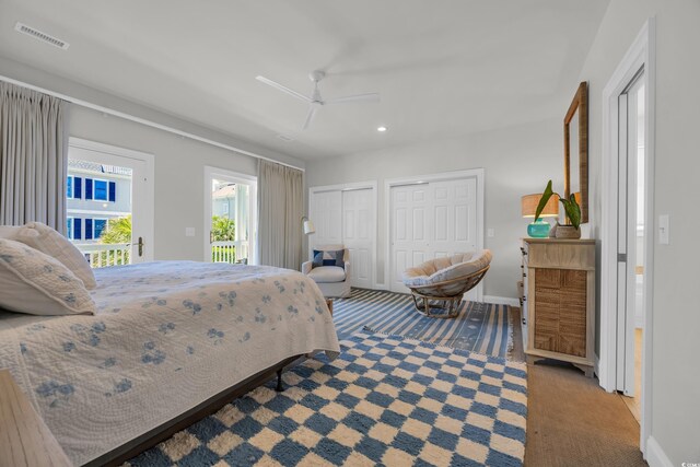573 S Dunes Dr, Pawleys Island, SC 29585 - carpeted bedroom featuring access to outside, two closets, recessed lighting, and ceiling fan