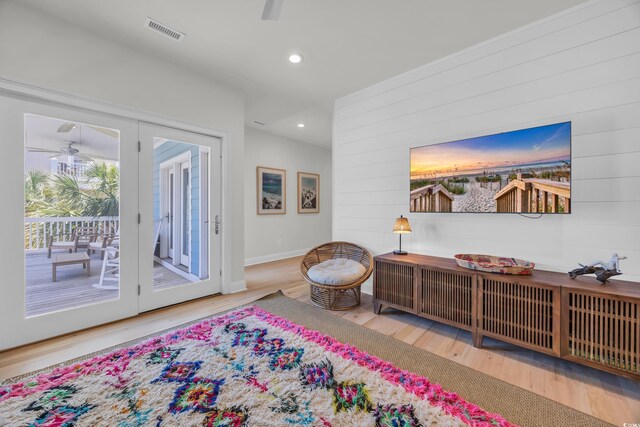 573 S Dunes Dr, Pawleys Island, SC 29585 - sitting room with wood finished floors, recessed lighting, wood walls, and a ceiling fan