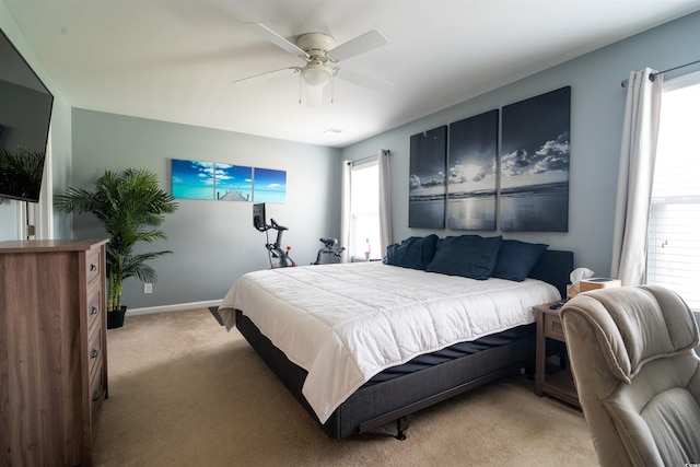 318 Castle Dr Unit 1443, Myrtle Beach, SC 29579 - bedroom with light carpet, ceiling fan, and baseboards