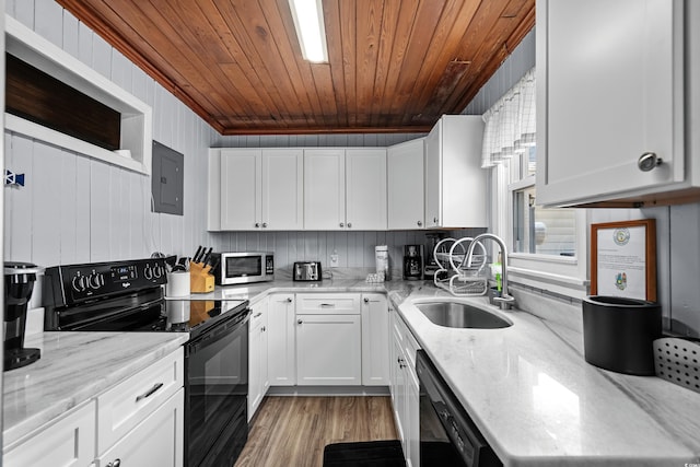 2006 S Ocean Blvd, North Myrtle Beach, SC 29582 - kitchen with black appliances, a sink, electric panel, white cabinets, and wooden ceiling