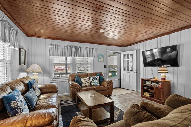 2006 S Ocean Blvd, North Myrtle Beach, SC 29582 - living room featuring wood ceiling, crown molding, and wood walls