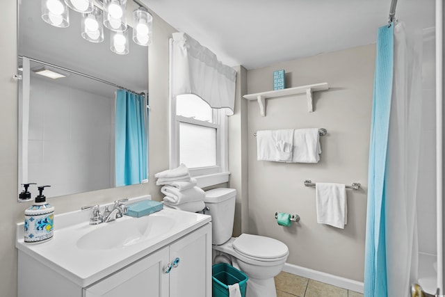 2006 S Ocean Blvd, North Myrtle Beach, SC 29582 - bathroom with vanity, toilet, tile patterned flooring, and a shower with shower curtain