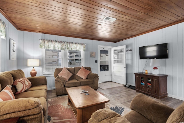 2006 S Ocean Blvd, North Myrtle Beach, SC 29582 - living area featuring wooden ceiling, ornamental molding, wood finished floors, and wooden walls