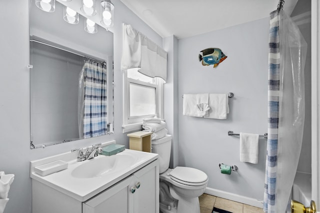 2006 S Ocean Blvd, North Myrtle Beach, SC 29582 - full bath featuring toilet, vanity, tile patterned flooring, and a shower with curtain