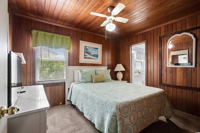 2006 S Ocean Blvd, North Myrtle Beach, SC 29582 - bedroom with light carpet, wood walls, wood ceiling, a ceiling fan, and ensuite bathroom