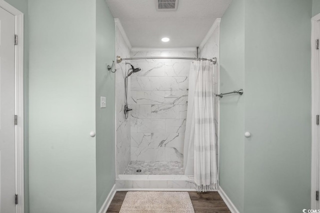 312 35th Ave N, North Myrtle Beach, SC 29582 - full bath with a stall shower, wood finished floors, recessed lighting, and crown molding