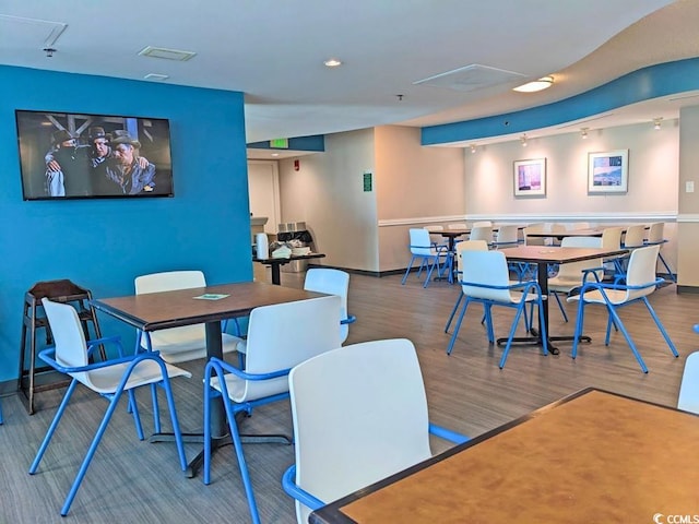 2301 S Ocean Blvd Unit 1405, North Myrtle Beach, SC 29582 - dining space featuring wood finished floors and baseboards