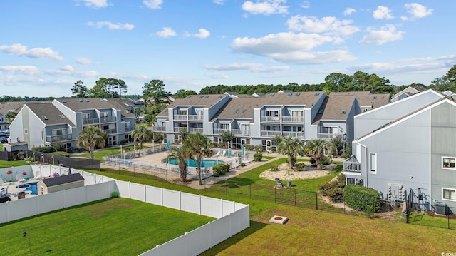 1890 Colony Dr Unit 17L, Surfside Beach, SC 29575 - surrounding community featuring a residential view and a swimming pool