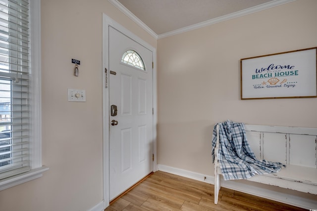 321 53rd Ave N, North Myrtle Beach, SC 29582 - entryway with ornamental molding and light wood-style flooring