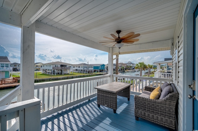 321 53rd Ave N, North Myrtle Beach, SC 29582 - deck featuring a residential view, a water view, and a ceiling fan