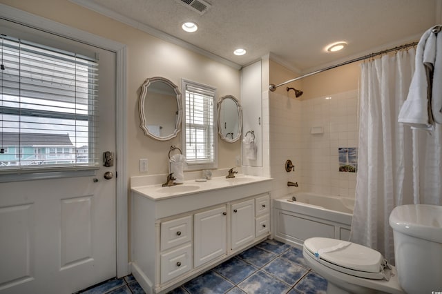 321 53rd Ave N, North Myrtle Beach, SC 29582 - full bath with ornamental molding, shower / bath combo, double vanity, tile patterned flooring, and a textured ceiling
