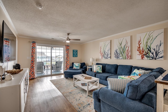 321 53rd Ave N, North Myrtle Beach, SC 29582 - living area featuring a textured ceiling, ornamental molding, light wood-style flooring, and ceiling fan