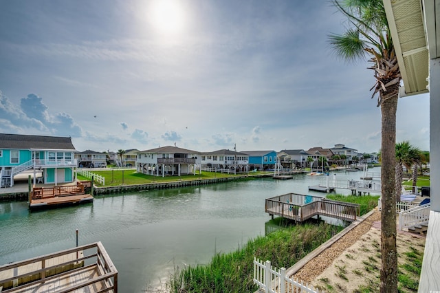 321 53rd Ave N, North Myrtle Beach, SC 29582 - dock area featuring a residential view and a water view