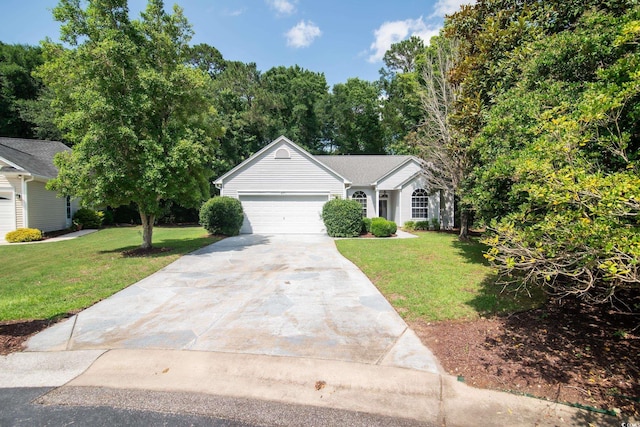 161 Patriot Ln, Pawleys Island, SC 29585 - view of front facade with a garage, driveway, and a front yard