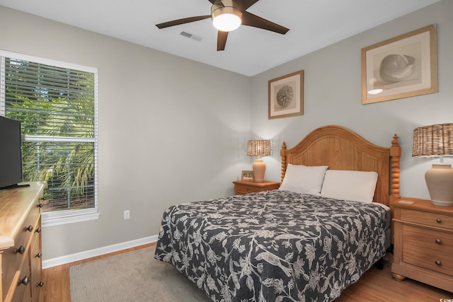 161 Patriot Ln, Pawleys Island, SC 29585 - bedroom with wood finished floors and ceiling fan