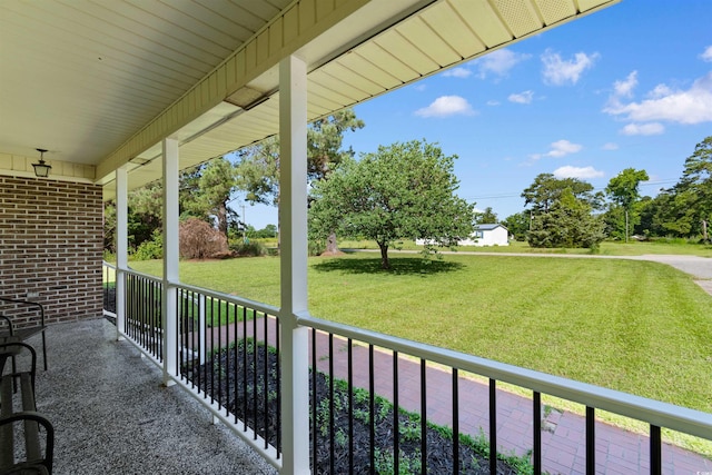 308 Old Stage Rd, Mullins, SC 29574 - covered porch featuring a yard