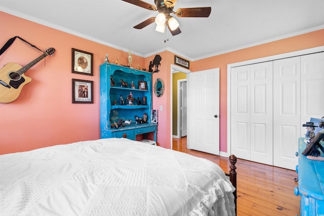 308 Old Stage Rd, Mullins, SC 29574 - bedroom featuring wood-type flooring, ornamental molding, a closet, a ceiling fan, and baseboards