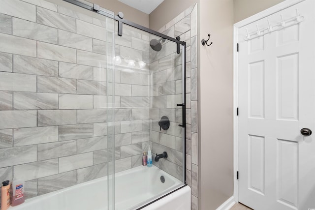 308 Old Stage Rd, Mullins, SC 29574 - bathroom featuring shower / bath combination with glass door and baseboards