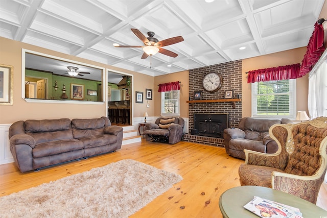 308 Old Stage Rd, Mullins, SC 29574 - living room with ceiling fan, hardwood / wood-style floors, coffered ceiling, beamed ceiling, and a fireplace