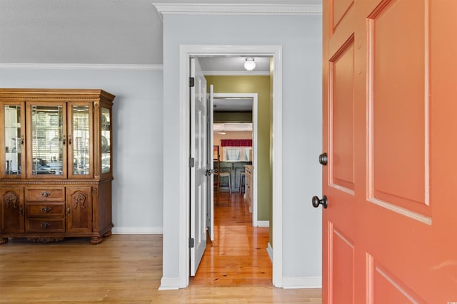 308 Old Stage Rd, Mullins, SC 29574 - corridor featuring crown molding, light wood-style floors, and baseboards