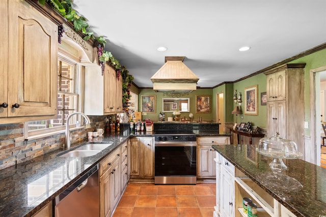308 Old Stage Rd, Mullins, SC 29574 - kitchen featuring appliances with stainless steel finishes, a sink, light tile patterned flooring, backsplash, and recessed lighting