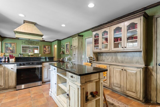 308 Old Stage Rd, Mullins, SC 29574 - kitchen featuring stainless steel electric stove, open shelves, a center island, recessed lighting, and glass insert cabinets
