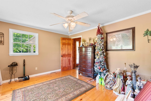308 Old Stage Rd, Mullins, SC 29574 - entrance foyer featuring hardwood / wood-style flooring, a ceiling fan, crown molding, and baseboards