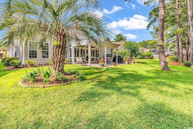6434 Longwood Dr, Murrells Inlet, SC 29576 - view of grassy yard with a patio