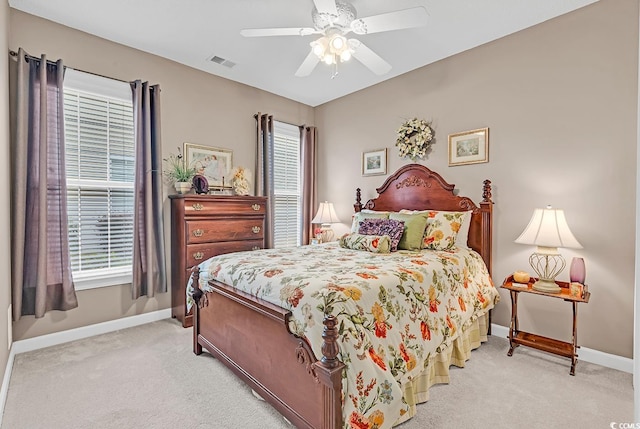 6434 Longwood Dr, Murrells Inlet, SC 29576 - bedroom with baseboards, light carpet, and multiple windows