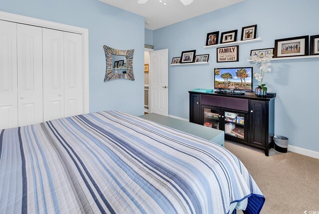 6434 Longwood Dr, Murrells Inlet, SC 29576 - carpeted bedroom featuring a closet, baseboards, and a ceiling fan