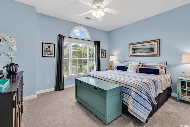 6434 Longwood Dr, Murrells Inlet, SC 29576 - bedroom featuring light colored carpet, baseboards, and a ceiling fan