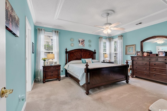 6434 Longwood Dr, Murrells Inlet, SC 29576 - bedroom featuring crown molding, light carpet, a textured ceiling, baseboards, and ceiling fan