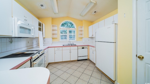 434 Deer Path, Calabash, NC 28467 - kitchen with white appliances, a sink, open shelves, vaulted ceiling, and decorative backsplash