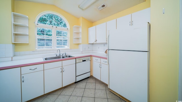434 Deer Path, Calabash, NC 28467 - kitchen with white appliances, open shelves, a sink, lofted ceiling, and white cabinetry