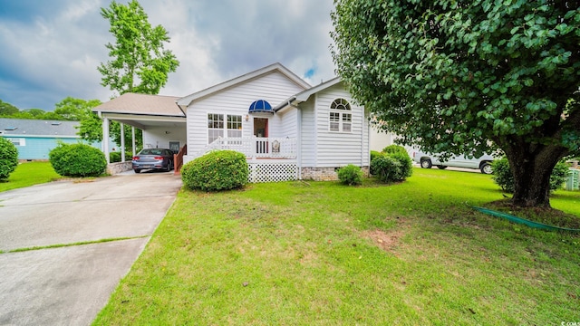 434 Deer Path, Calabash, NC 28467 - view of front of house with concrete driveway, a carport, a front lawn, and crawl space