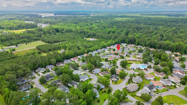 434 Deer Path, Calabash, NC 28467 - aerial perspective of suburban area featuring a heavily wooded area