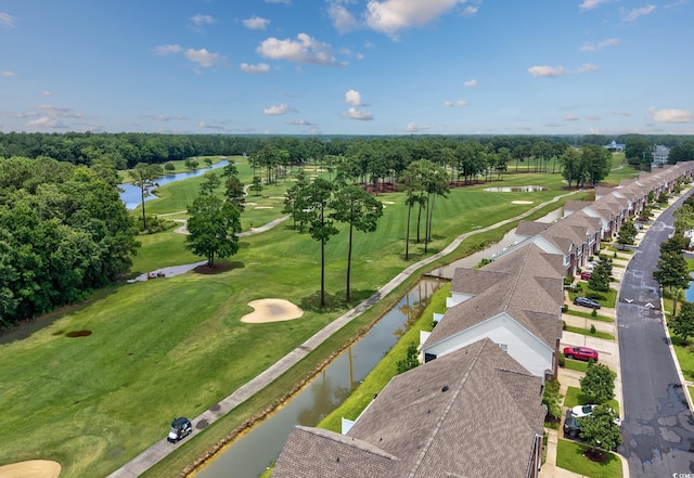 265 Connemara Dr Unit D, Myrtle Beach, SC 29579 - bird's eye view of a large body of water, a golf club, and a tree filled landscape