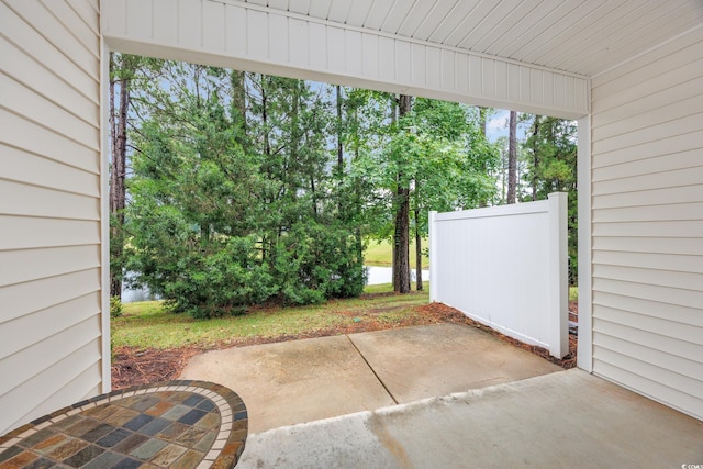 265 Connemara Dr Unit D, Myrtle Beach, SC 29579 - view of patio with a water view and view of scattered trees