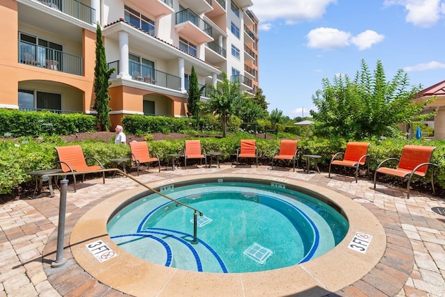8121 Amalfi Pl Unit 4-1006, Myrtle Beach, SC 29572 - view of swimming pool with a swimming pool, a patio area, and a community hot tub