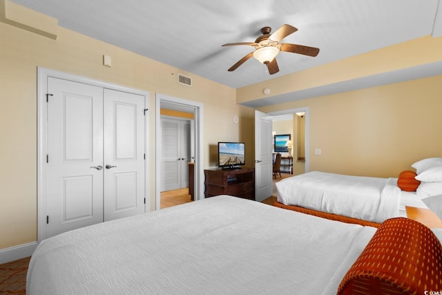 8121 Amalfi Pl Unit 4-1006, Myrtle Beach, SC 29572 - bedroom featuring a closet, ceiling fan, and baseboards
