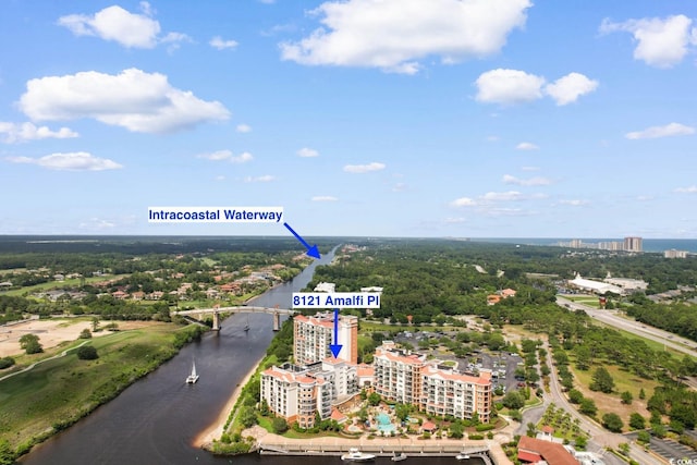 8121 Amalfi Pl Unit 4-1006, Myrtle Beach, SC 29572 - drone / aerial view of a nearby body of water, a notable bridge, and apartment complex