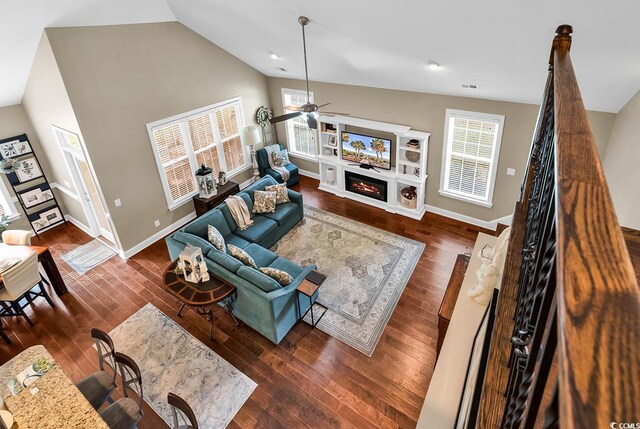 904 Moultrie Cir, Myrtle Beach, SC 29588 - living room with ceiling fan, a warm lit fireplace, wood finished floors, and high vaulted ceiling