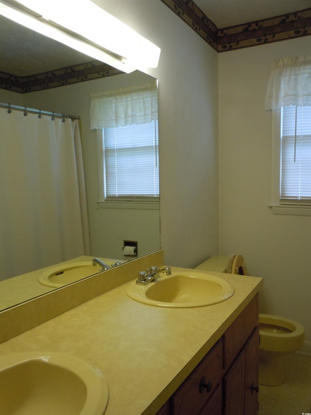 8202 Joe Brown Hwy S, Clarendon, NC 28432 - bathroom with double vanity and a shower with shower curtain