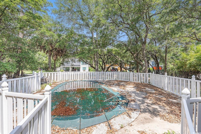 910 N Dogwood Dr, Surfside Beach, SC 29575 - view of swimming pool with a fenced backyard